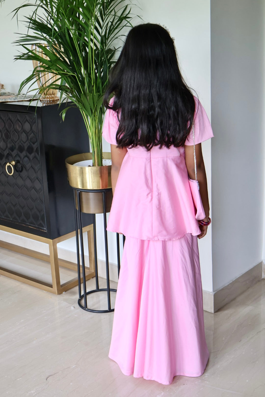 Pink sharara with matching hair band and purse